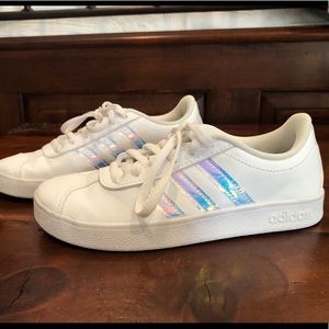 Adidas shoes with silver stripes